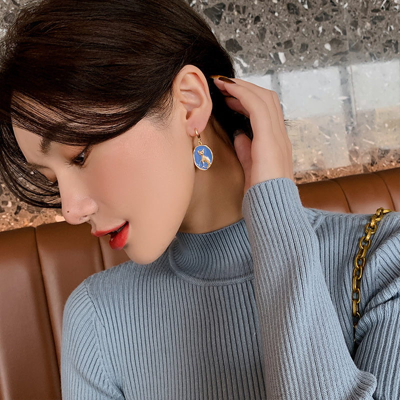 Cold Wind Dripping Oval Cat Earrings