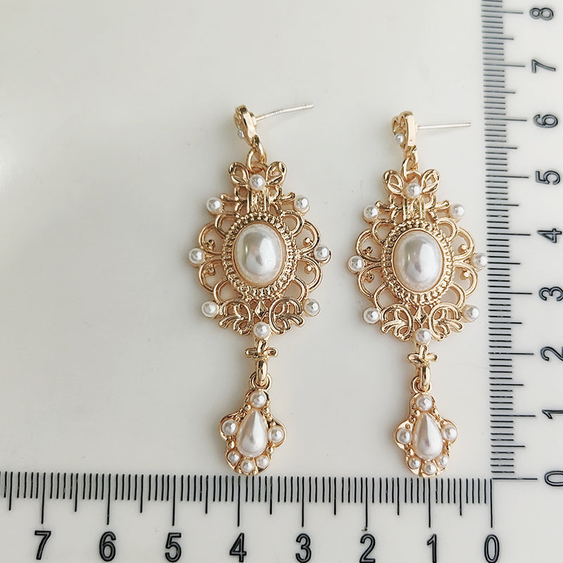 Boucles d'oreilles baroques en perles avec tige en argent