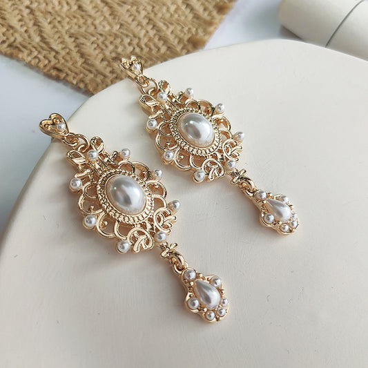 Boucles d'oreilles Vintage Court en perles baroques, tige argentée