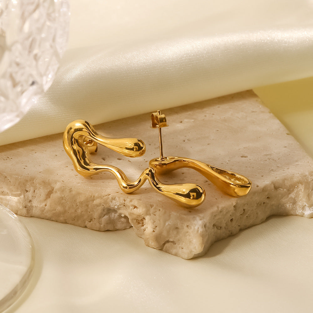 Boucles d'oreilles en acier titane plaqué or 