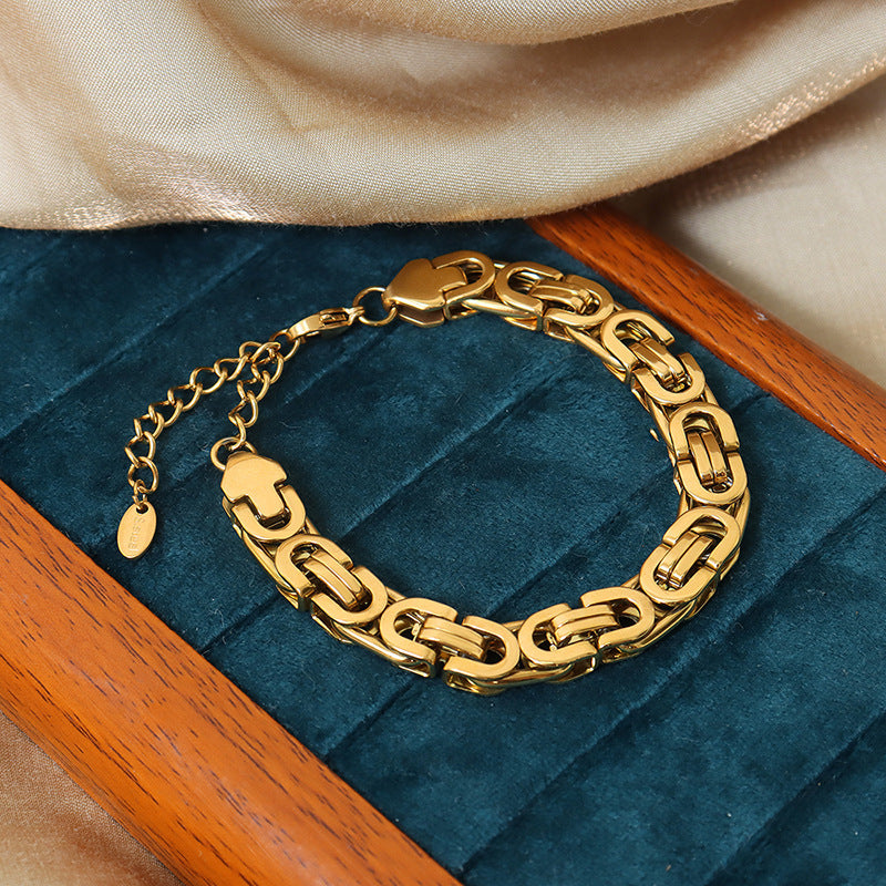 Bracelet maille en acier titane plaqué or 18 carats
