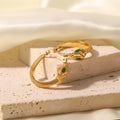 Snake-shaped Green Eye Stainless Steel Earrings