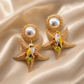 Boucles d'oreilles fantaisie en perles et étoiles de mer émaillées