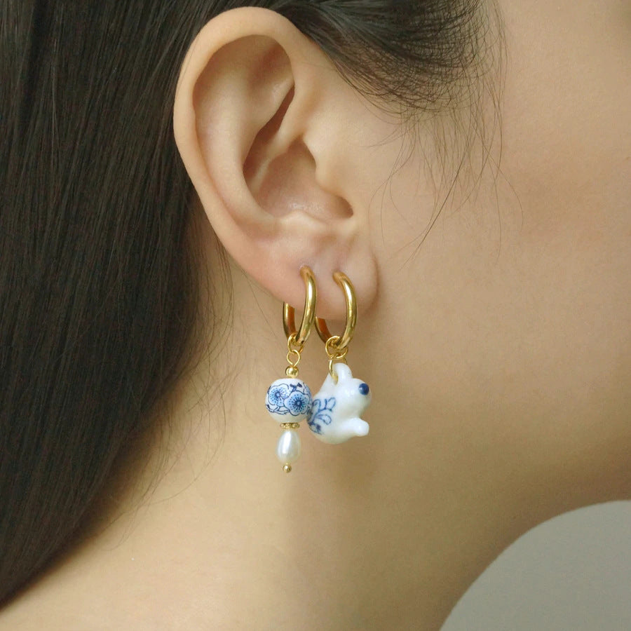 Boucles d'oreilles en porcelaine et or 18 carats