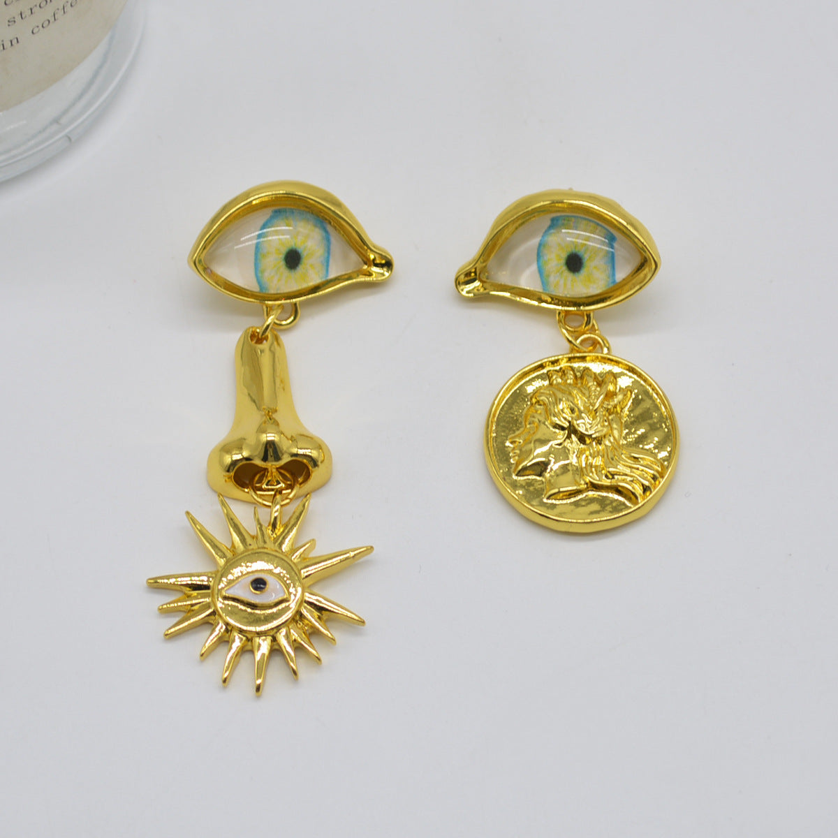 Boucles d'oreilles soleil style rétro vintage en forme d'oeil d'or