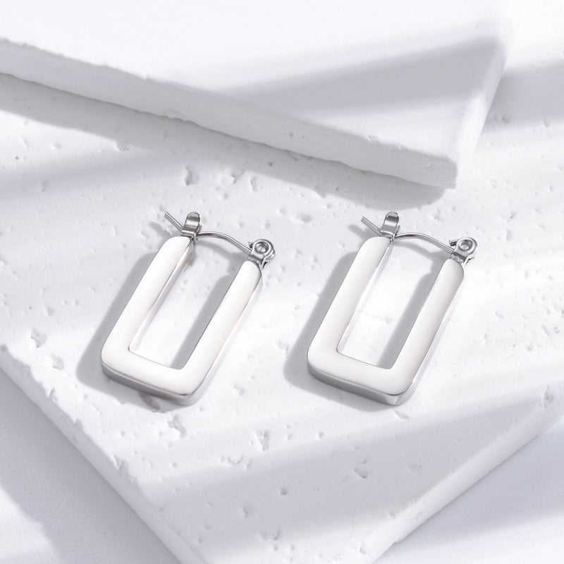 Boucles d'oreilles simples géométriques en acier inoxydable brillant en titane