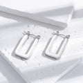 Boucles d'oreilles simples géométriques en acier inoxydable brillant en titane