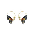 Boucles d'oreilles en cuivre avec broderie papillon