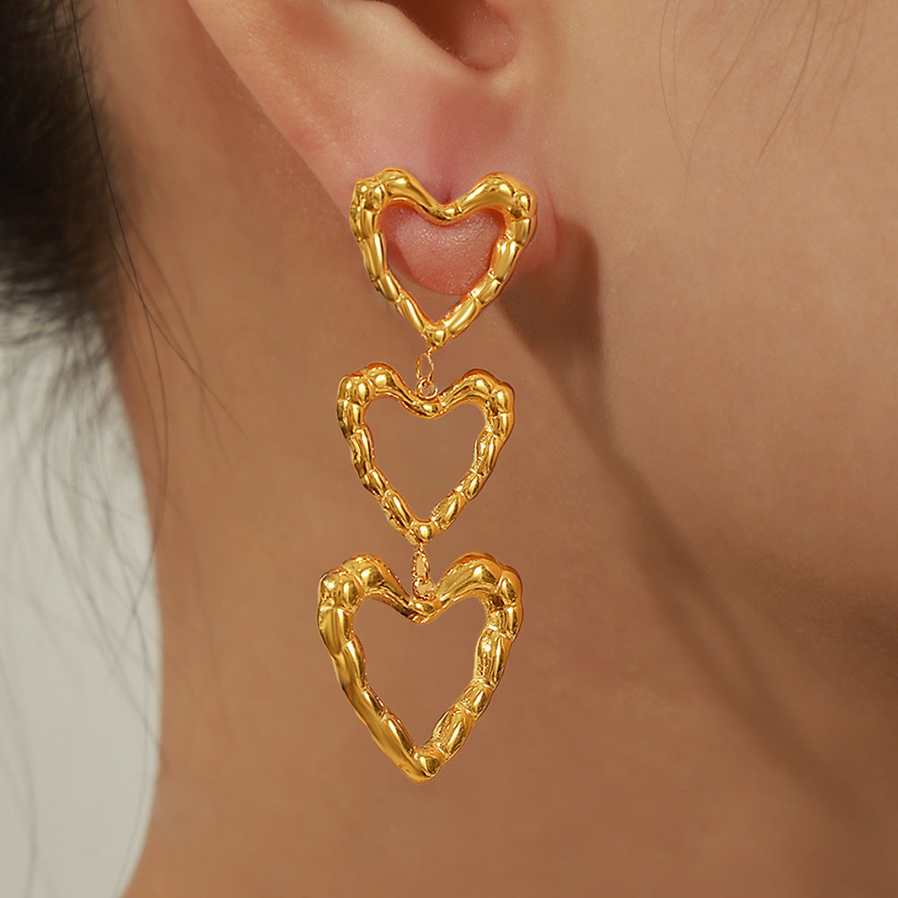 High-grade Peach Heart Earrings Titanium Steel Gold Plated Retro Minority Irregular Design