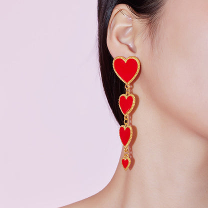 Boucles d'oreilles à pampilles longues avec pendentif en forme de cœur rouge en émail imbriqué pour femmes